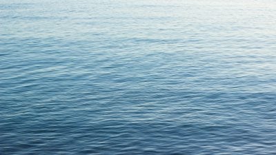 lake blue water smooth surface simple nature background